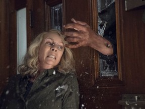 This image released by Universal Pictures shows Jamie Lee Curtis in a scene from "Halloween," in theaters nationwide on Oct. 19. (Ryan Green/Universal Pictures via AP)