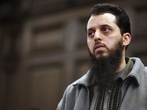 FILE - In this Jan. 8, 2007 file picture Moroccan Mounir El Motassadeq waits prior his trial at a court in Hamburg, northern Germany, The Moroccan man has been sentenced to a 15-year prison sentence in Germany for helping three of the suicide pilots in the 9/11 attacks on the U.S.