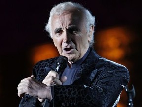 FILE - In this July 9, 2009 file photo, French singer Charles Aznavour performs during a concert at the annual Beiteddine cultural festival in the central Chouf mountains east of Beirut, Lebanon. Charles Aznavour, the French crooner and actor whose performing career spanned eight decades, has died. He was 94.