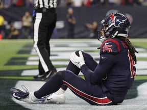Will Fuller of the Houston Texans holds his knee in the end zone during a game against the Miami Dolphins at NRG Stadium on October 25, 2018 in Houston. (Tim Warner/Getty Images)