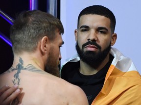 Conor McGregor, left, and rapper Drake attend a ceremonial weigh-in for UFC 229 at T-Mobile Arena on Oct. 5, 2018 in Las Vegas, Nevada. (Ethan Miller/Getty Images)