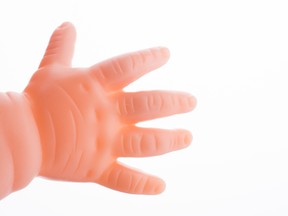 File photo of a doll's hand. (Getty Images)