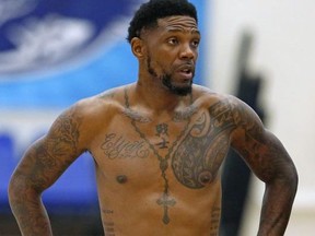 Miami Heat forward Udonis Haslem looks on during practice on the last day of the Miami Heat NBA basketball team training camp in Boca Raton, Fla., Friday, Sept. 28, 2018. (David Santiago/Miami Herald via AP) ORG XMIT: FLMIH110