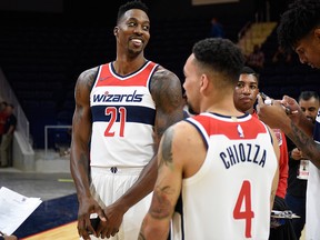 Washington Wizards' Dwight Howard stands near to Chris Chiozza during an NBA basketball media day, Monday, Sept. 24, 2018, in Washington.