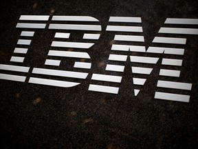 In this April 26, 2017, file photo, the IBM logo is displayed on the IBM building in New York City.