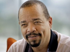 FILE - In this June 11, 2012 file photo shows rapper and actor Ice-T in Atlanta.  Police arrested Ice-T for failing to pay a toll at the George Washington Bridge.  The actor and rapper was ticketed for theft of services on Wednesday, Oct. 24, 2018,  when he drove through E-ZPass leading to the span that connects New Jersey with New York. The 60-year-old, whose real name Tracy Marrow, was driving a new McLaren sports car and was also ticketed for not having license plates and registration.