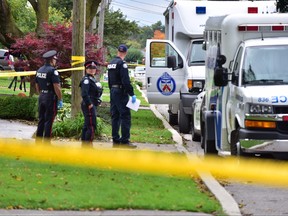 Police investigate a brazen daylight shooting outside a home on Camborne Ave. in Downsview. Neighbours say a 26-year-old male was shot to death while behind the wheel of a car in his driveway.