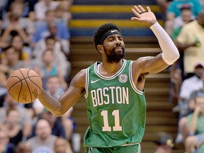 Kyrie Irving of the Boston Celtics dribbles up court against the Charlotte Hornets in the third quarter during a preseason game at Dean Smith Center on Sept. 28, 2018 in Chapel Hill, N.C.