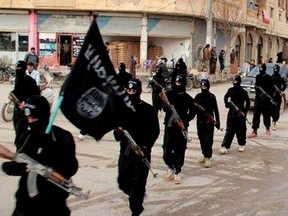 ISIS fanatics march in Syria before the caliphate came crumbling down.