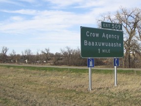 This April 10, 2006 file photo shows a sign along Interstate 90 on the Crow Indian reservation near Crow Agency, Mont.