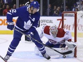 Toronto Maple Leafs Patrick Marleau tries to tip the puck past Montreal Canadiens Carey Price during the first period in Toronto on Wednesday October 3, 2018. Jack Boland/Toronto Sun/Postmedia Network