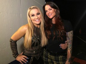 Nattie and Lita pose backstage at a recent Raw show.