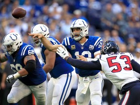 Indianapolis Colts' Andrew Luck of the throws a pass during the game against the Houston Texans at Lucas Oil Stadium on Sept. 30, 2018 in Indianapolis, Ind.