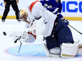 Roberto Luongo of the Florida Panthers makes a save during Opening Night against the Tampa Bay Lightning at Amalie Arena on Oct. 6, 2018 in Tampa, Fla.