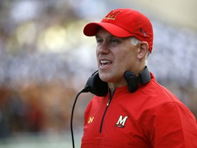 In this Saturday, Sept. 9, 2017, file photo, Maryland head coach DJ Durkin stands on the sideline during an NCAA college football game against Towson in College Park, Md.