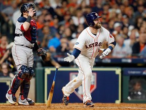 Brian McCann of the Houston Astros flies out in the sixth inning against the Boston Red Sox during Game 3 of the American League Championship Series at Minute Maid Park on Oct. 16, 2018 in Houston, Texas.