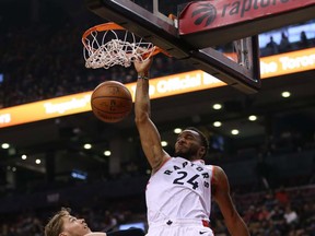 Raptors Norman Powell dunks against Melbourne last night. Powell had 21 points, three rebounds and three assists, hitting 3-of-5 three-point attempts.   (Jack Boland/Toronto Sun)