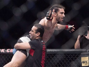 Elias Theodorou from Mississauga, Ont. celebrates his unanimous decision over Cezar Ferreira in a middleweight bout at UFC Fight Night in Halifax on Feb. 19, 2017.