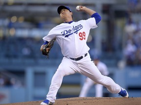 Los Angeles Dodgers starting pitcher Hyun-Jin Ryu throws to an Atlanta Braves batter during the first inning of Game 1 of a baseball National League Division Series, Thursday, Oct. 4, 2018, in Los Angeles.