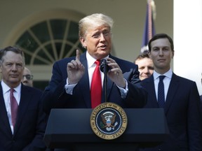 President Donald Trump speaks as he announces a revamped North American free trade deal, in the Rose Garden of the White House in Washington, Monday, Oct. 1, 2018. The new deal, reached just before a midnight deadline imposed by the U.S., will be called the United States-Mexico-Canada Agreement, or USMCA. It replaces the 24-year-old North American Free Trade Agreement, which President Donald Trump had called a job-killing disaster.