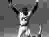 In this July 3, 1980, file photo, San Francisco Giants' Willie McCovey raises his hands in salute to the cheering crowd after he was replaced in the lineup in the team's baseball game with the Cincinnati Reds in San Francisco.