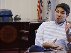 In this Jan. 6, 2016, file photo newly elected Fall River Mayor Jasiel Correia talks in his city hall office in Fall River, Mass.