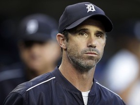 In this Sept. 22, 2017, file photo, Tigers manager Brad Ausmus appears in the dugout before a baseball game against the Twins, in Detroit. Ausmus has been named the Los Angeles Angels' manager, Sunday, Oct. 21, 2018.