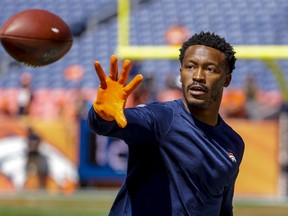 In this Sept. 9, 2018 photo Denver Broncos wide receiver Demaryius Thomas catches a pass before a game against the Seattle Seahawks in Denver.