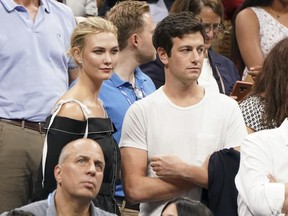 In this Sept. 6, 2018 file photo, Karlie Kloss, top left, and Joshua Kushner attend the semifinals of the U.S. Open tennis tournament at the USTA Billie Jean King National Tennis Center in New York.