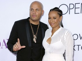 In this April 13, 2016 file photo, Stephen Belafonte, left, and his wife Melanie Brown arrive at the Los Angeles premiere of "Mother's Day."