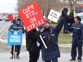 Members of CUPW Local 612 picket outside the Canada Post processing plant on Lasalle Boulevard in Sudbury, Ont. on Friday October 26, 2018. Local Canada Post workers went on strike Friday as part of rotating strikes across Canada.
