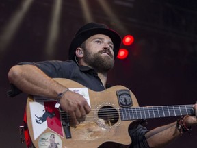 Frontman Zac Brown with the Zac Brown Band performs on the main stage during Big Valley Jamboree 2014 in Camrose, Alta., on Saturday, Aug. 2, 2014.