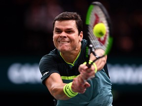 Milos Raonic plays a backhand against Jo-Wilfried Tsonga during Day 2 of the Rolex Paris Masters on October 30, 2018 in Paris, France. (Justin Setterfield/Getty Images)