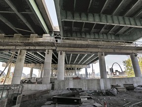This Sunday, Oct. 28, 2018 photo shows a view of the scene where Ricardo Davis, a Washington Park auxiliary officer fell through the opening of the bridge and landed underneath the Poplar Street Bridge. (J.B. Forbes/St. Louis Post-Dispatch via AP)