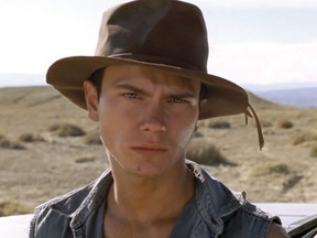 In this undated photo provided by the Miami International Film Festival, actor River Phoenix is shown while filming the movie "Dark Blood." After his death, there was talk of finding another actor to replace Phoenix or using special effects to finish the film which was about 80 percent complete, but director George Sluizer ultimately passed on those options and the film footage sat untouched in a vault for years. Sluizer was diagnosed with an arrhythmia in 2007, but the director made a miraculous recovery and felt compelled to finish "Dark Blood" before it was too late. The film had its U.S. premiere at the Miami International Film Festival on Wednesday, March 6, 2013 in Miami. (AP Photo/Miami International Film Festival) ORG XMIT: FLWL103 ORG XMIT: POS1303080937415912