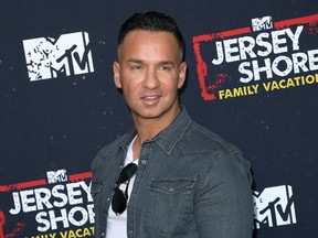 In this March 29, 2018 file photo, Mike "The Situation" Sorrentino arrives at the "Jersey Shore Family Vacation" premiere in Los Angeles. (Photo by Willy Sanjuan/Invision/AP, File)