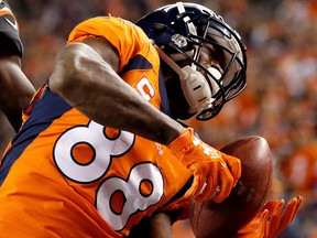 In this Nov. 19, 2017, file photo, Denver Broncos wide receiver Demaryius Thomas pulls in a touchdown pass during the second half of an NFL game against the Cincinnati Bengals in Denver.