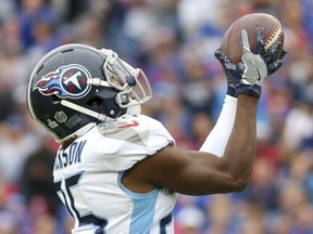 Tennessee Titans cornerback Adoree' Jackson intercepts a pass from Buffalo Bills quarterback Josh Allen during the second half of an NFL football game, Sunday, Oct. 7, 2018, in Orchard Park, N.Y.