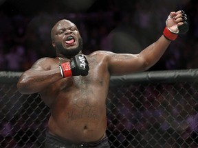 Derrick Lewis celebrates after defeating Alexander Volkov during a heavyweight mixed martial arts bout at UFC 229 in Las Vegas, Saturday, Oct. 6, 2018.