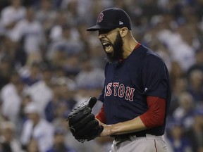Boston Red Sox pitcher David Price reacts during Game 5 of the World Series against the Los Angeles Dodgers on Sunday, Oct. 28, 2018, in Los Angeles.
