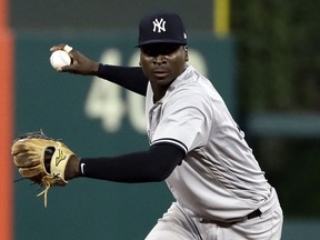 In this June 26, 2018, file photo, New York Yankees shortstop Didi Gregorius prepares to throw to first after fielding a ball during a game against the Phillies in Philadelphia.