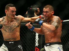 Max Holloway defeated Anthony Pettis at UFC 206 in Toronto in 2016 to win the UFC interim featherweight title. (DAVE ABEL/Toronto Sun)