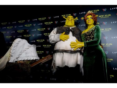 Tom Kaulitz and Heidi Klum show up dressed as Shrek and Princess Fiona to Klum's 19th Annual Halloween Party at Lavo on Oct. 31, 2018 in New York City.  (Michael Loccisano/Getty Images)