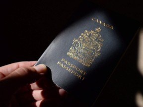 A Canadian passport is displayed in Ottawa on July 23, 2015. (The Canadian Press)