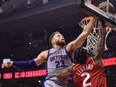 Detroit Pistons forward Blake Griffin rejects Toronto Raptors forward Kawhi Leonard during Wednesday's game.