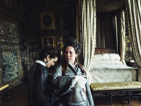 This image released by Fox Searchlight Films shows Rachel Weisz and Olivia Coleman, right, in a scene from the film "The Favourite."  (Yorgos Lanthimos/Fox Searchlight Films via AP)