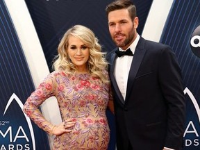 52nd CMA Awards Arrivals at Bridgestone Arena Nashville, TN  Featuring: Carrie Underwood, Mike Fisher. Judy Eddy/WENN.com