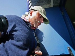 In this Aug. 7, 2007 file photo, Colombia's Juan Carlos Ramirez Abadia arrives to a federal police station after being arrested in Sao Paulo. (Evelson de Freitas/Agencia Estado via AP, File)