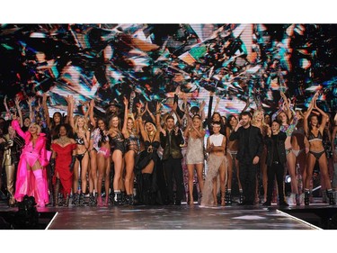 Models and performers wave at the end of the 2018 Victoria's Secret Fashion Show on Nov. 8, 2018 at Pier 94 in New York City.