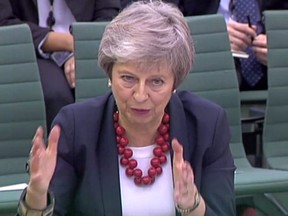 A video grab from footage broadcast by the UK Parliament's Parliamentary Recording Unit (PRU) shows Britain's Prime Minister Theresa May answer questions about her Brexit agenda by British MP's at a Parliamentary liaison committee meeting on November 29, 2018 in London.